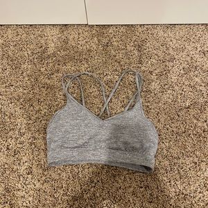 white and grey striped sports bra